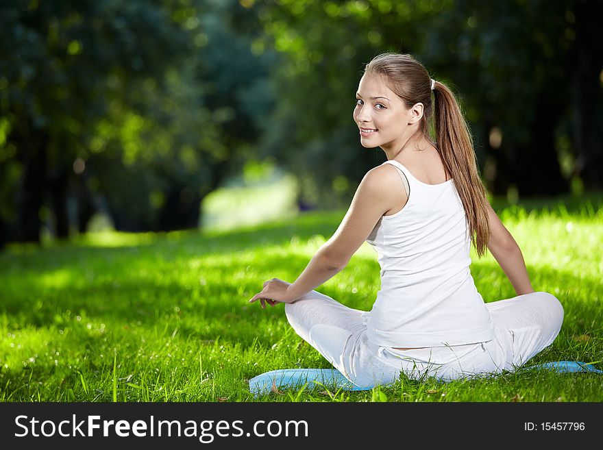 Young attractive girl in the park. Young attractive girl in the park