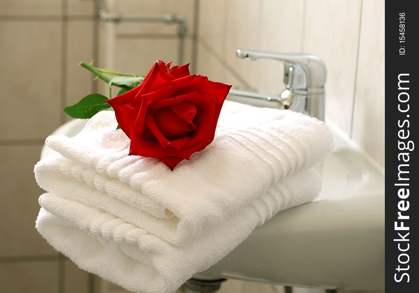 White Towels And Red Rose