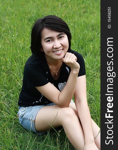 Portrait of a beautiful Asian woman at the park. Portrait of a beautiful Asian woman at the park.