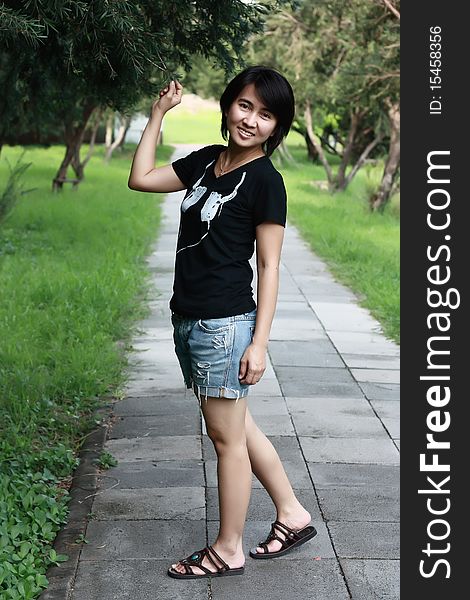 Portrait of a beautiful Asian woman at the park. Portrait of a beautiful Asian woman at the park.