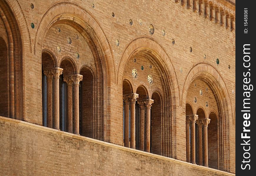 Detail of romanesque architecture in parma italy, columns and arches