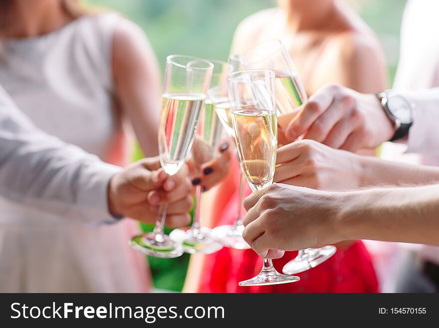 Friends In The Restaurant Having A Toast.