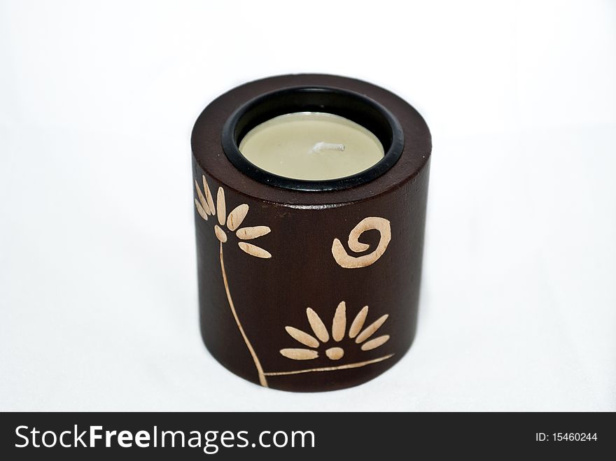 Decorative brown candlestick with candle