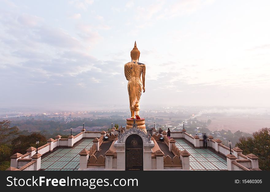 Walking Buddha statue at northen of thailand