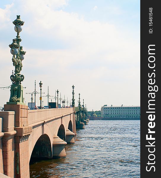 Russia, St. Petersburg. Troitskij Bridge against blue cloudy sky