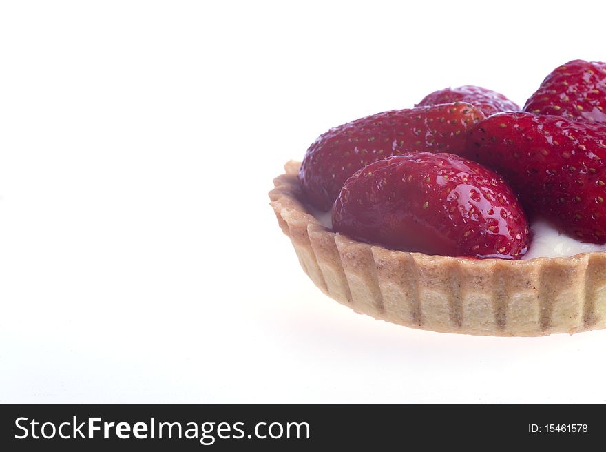 Studio shot of strawberry tarts isolated on a white background. Studio shot of strawberry tarts isolated on a white background.