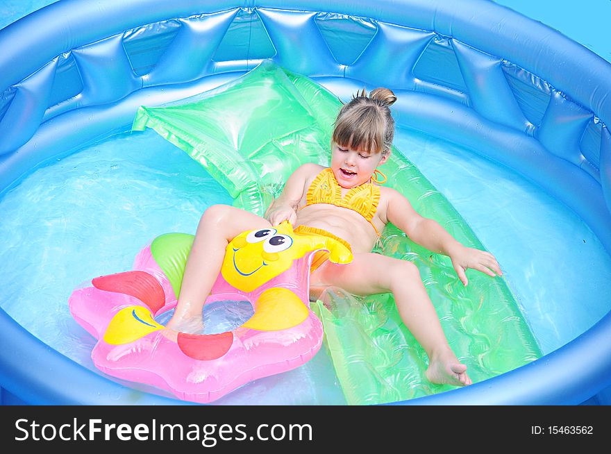 Girl enjoys herself in the pool