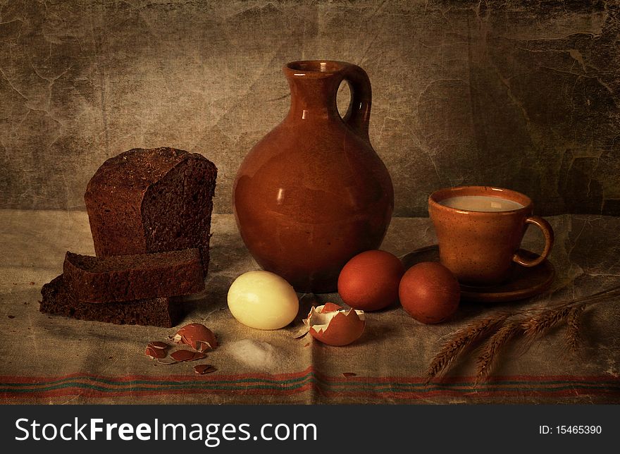 Modest country supper with rye bread, milk and egg