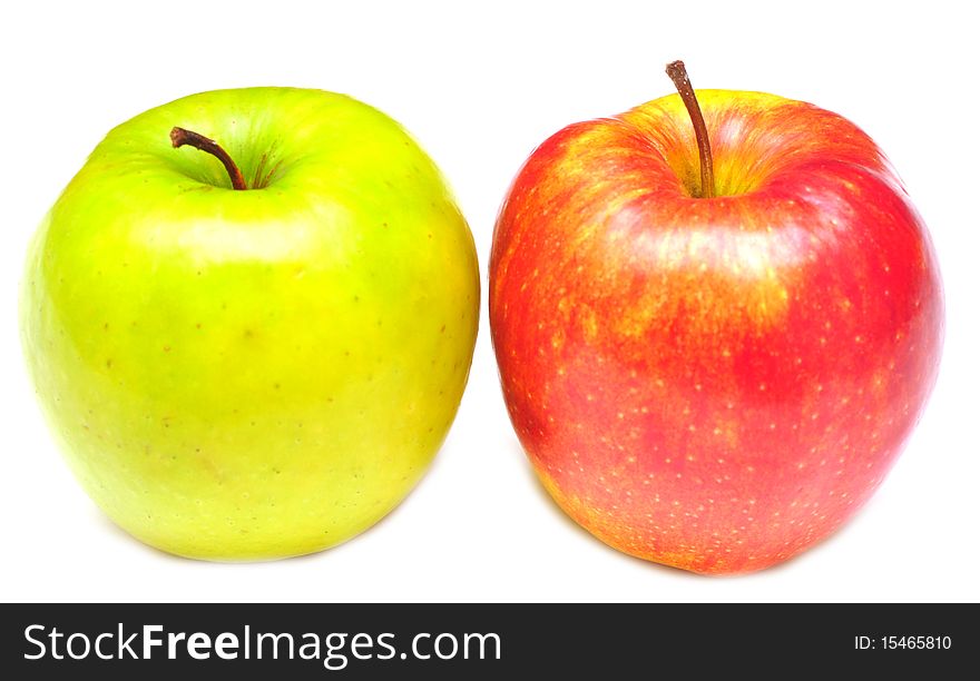 Red and green fresh apples isolate on white