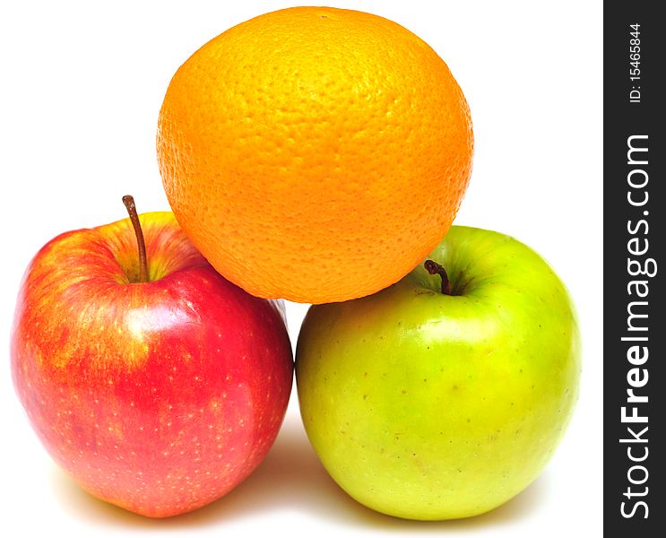 Stack of apple and orange on white background