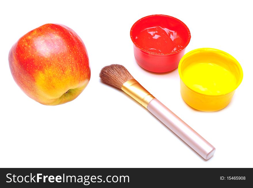 Apple and paints isolated on white background. Apple and paints isolated on white background