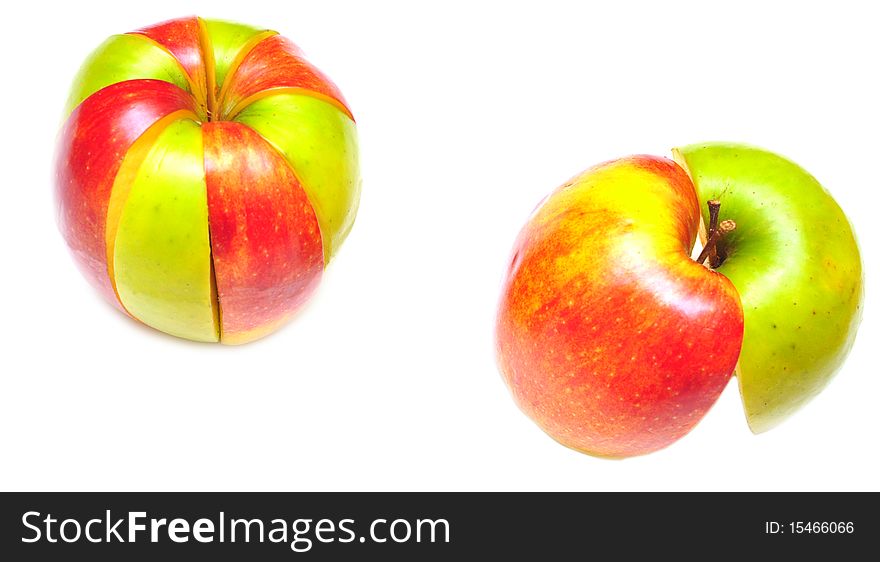 Sliced of red and green apple isolated on white background