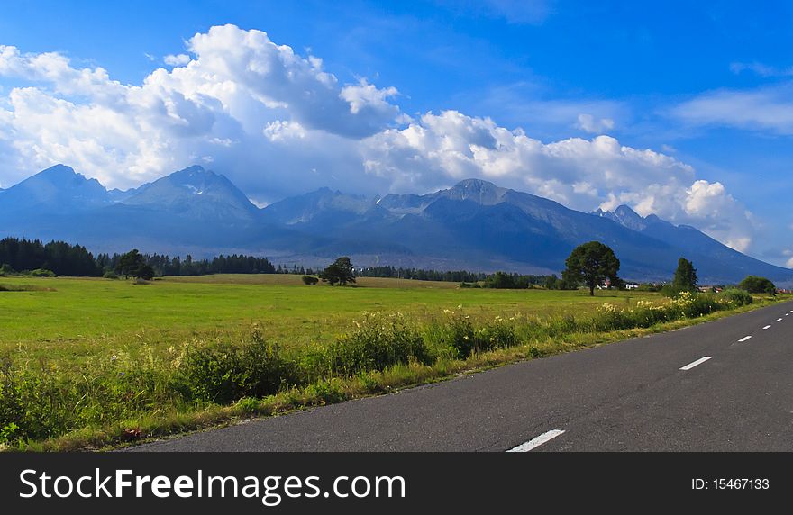 Road in Slovakia in front of the High Tatras