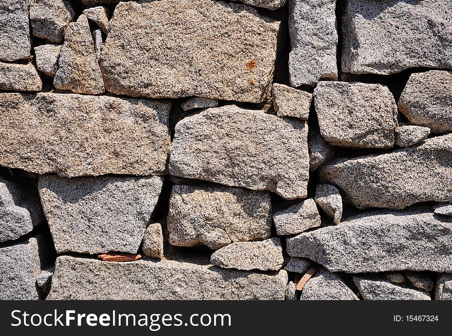 Stone wall background of historical home