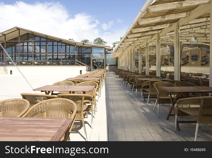 Summer terrace in cafe with wattled furniture