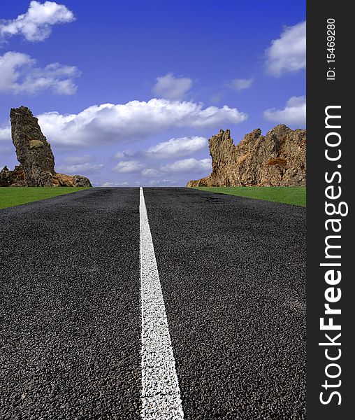 Perfect road with rocky background