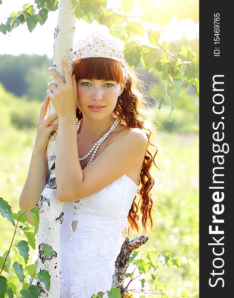 Beautiful girl near to a birch. Beautiful girl near to a birch