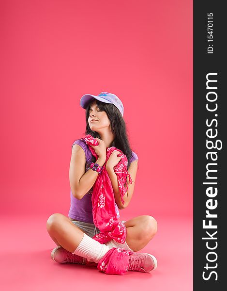 Hip hop dancer on the pink background