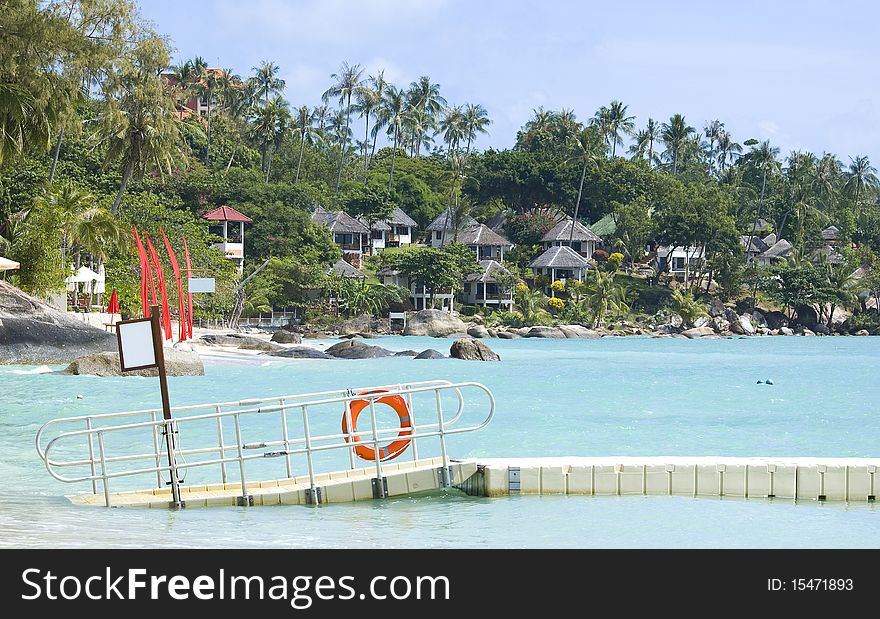 Pontoon Bridge With A Tropical Background