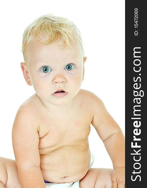 Blond-haired one year baby on white background. Blond-haired one year baby on white background