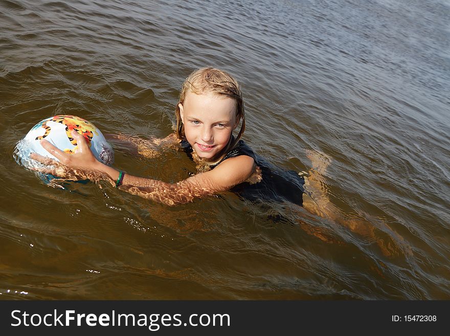 Girl swimming in the sea. Girl swimming in the sea.