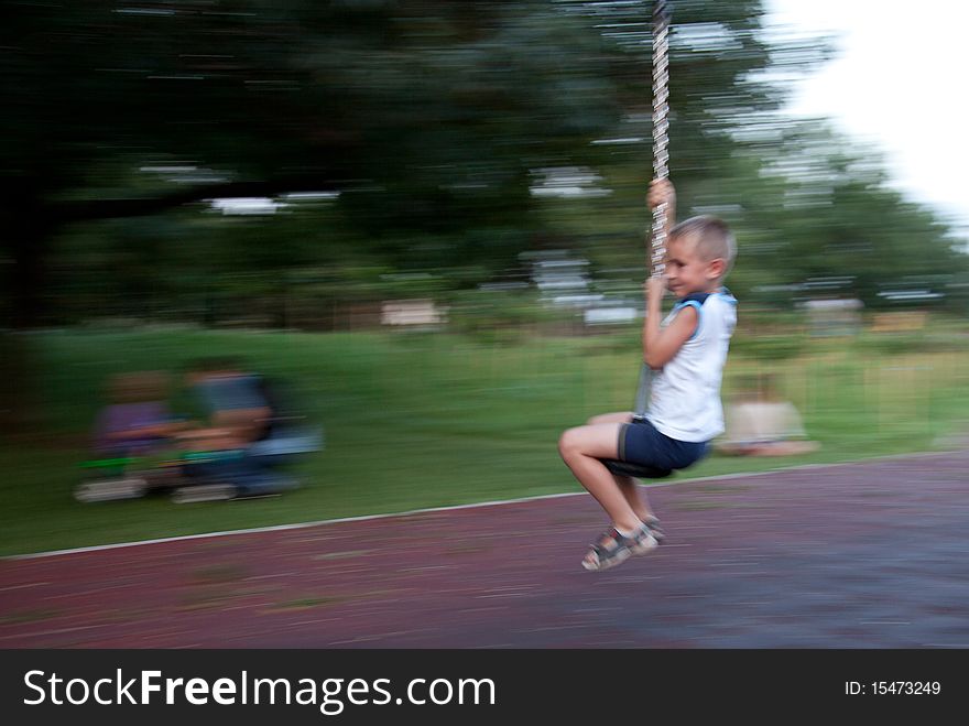 Young boy speed play - panning shot