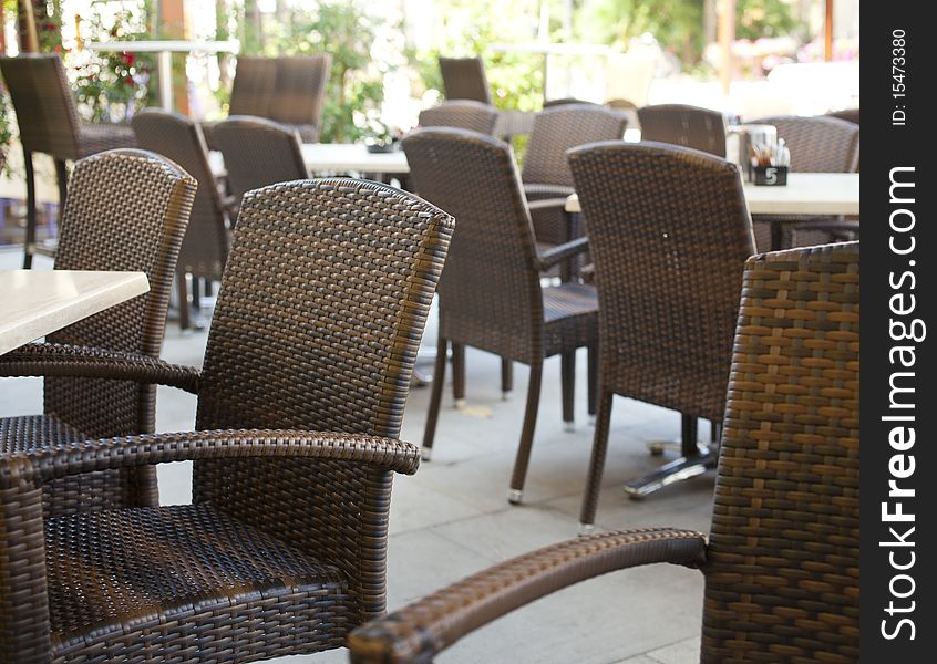 Restaurant tables with wicker chairs