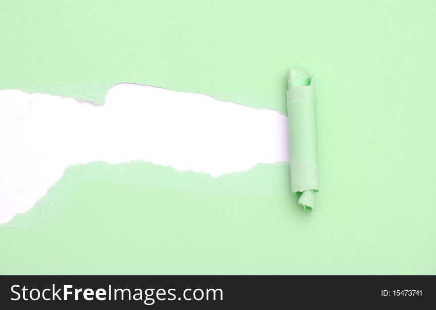 Ripped green Paper on yellow background. Ripped green Paper on yellow background