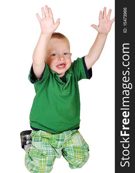 A lovely toddler kneeling on the floor in the studio holding up his
hands, on white background. A lovely toddler kneeling on the floor in the studio holding up his
hands, on white background.