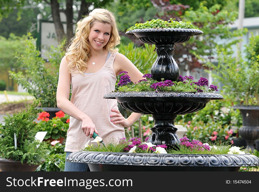 Beautiful Young Blond In The Garden