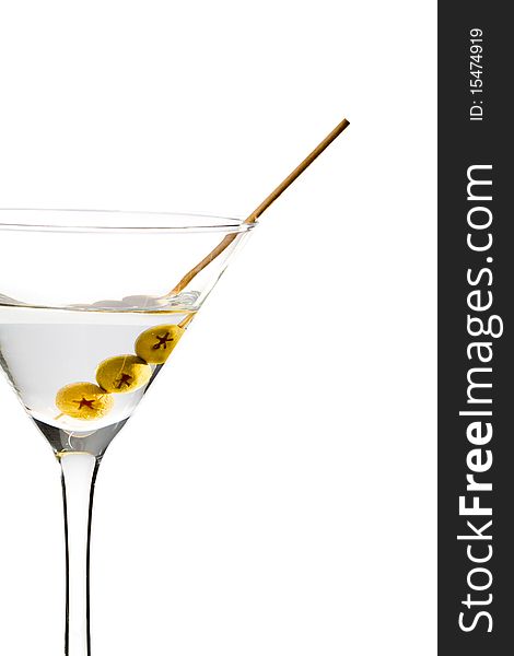 Martini with three olives isolated on white background