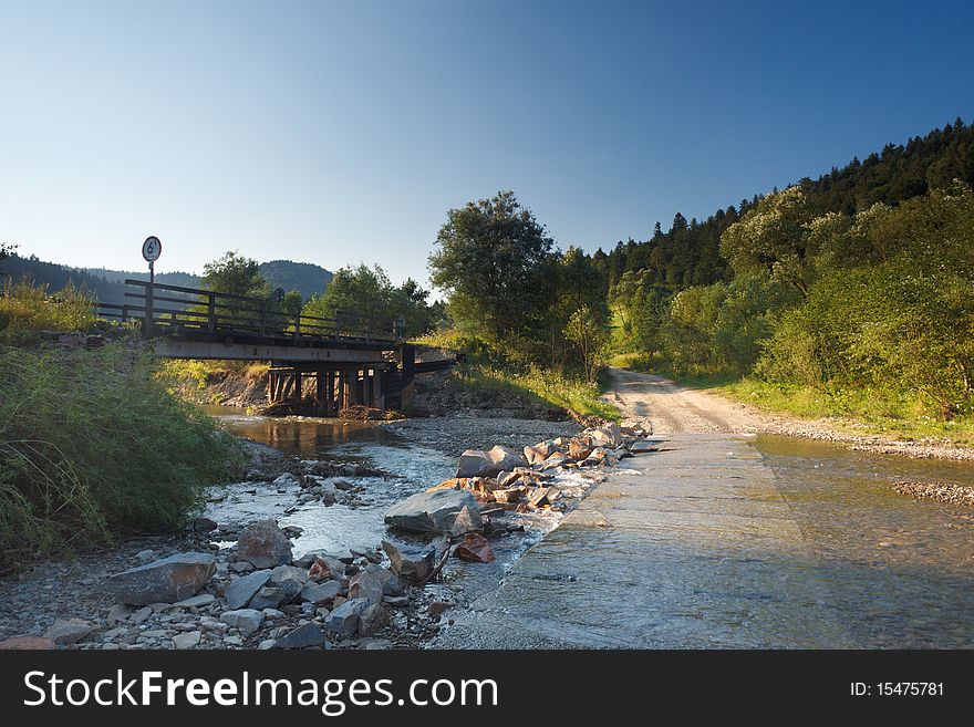 Polish mountain in summer with road and river. Polish mountain in summer with road and river