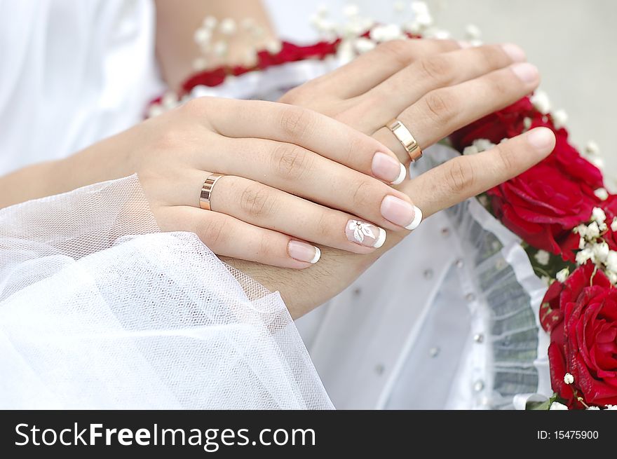 Hands bride wedding ring bouquet groom ceremony flowers. Hands bride wedding ring bouquet groom ceremony flowers