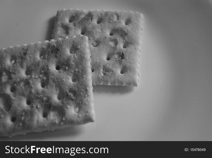 Two crackers on a dish