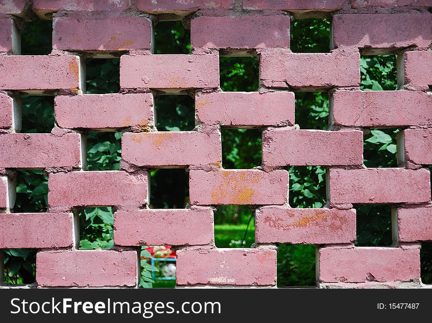 Wall from the painted brick with holes. Wall from the painted brick with holes