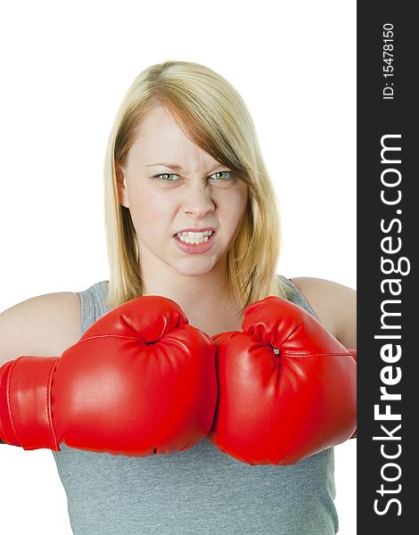 Young woman with red boxing gloves - isolated on white. Young woman with red boxing gloves - isolated on white