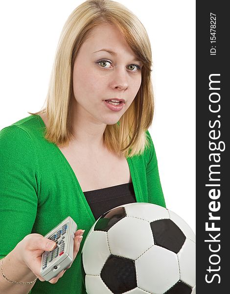 Young woman is zapping remote control by watching soccer matches. Young woman is zapping remote control by watching soccer matches