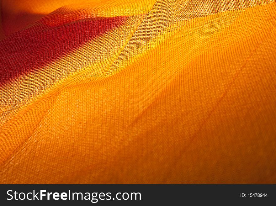 Lighting on golden cloth for background. Lighting on golden cloth for background