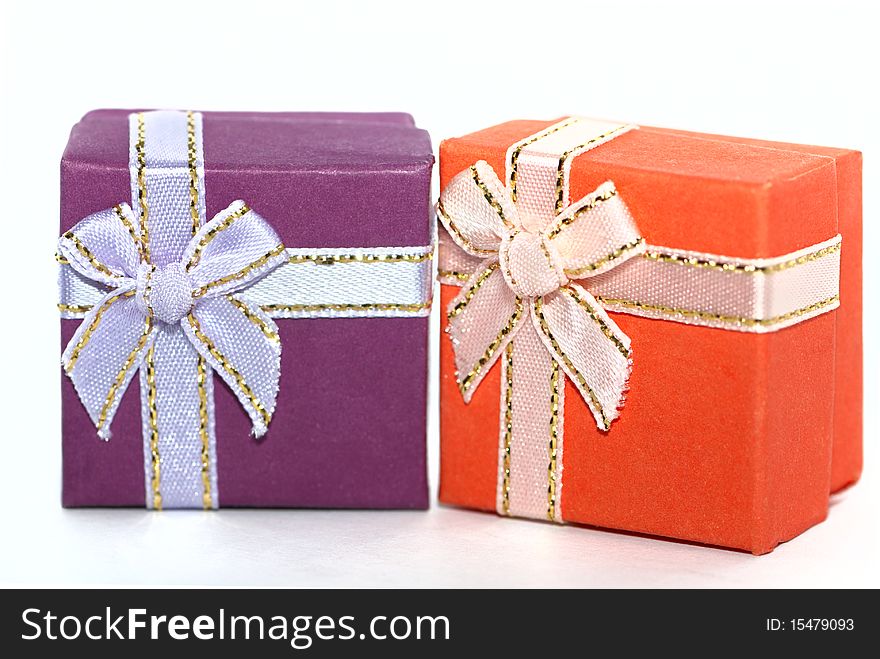 Two colored gift boxes isolated on white. Two colored gift boxes isolated on white