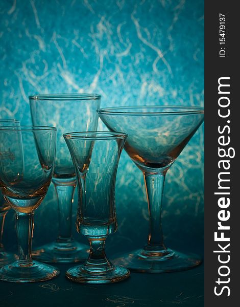 Many glass on blue background