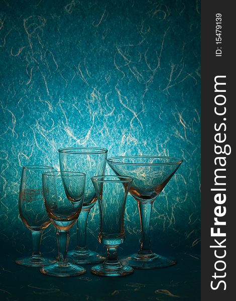 Many glass on blue background