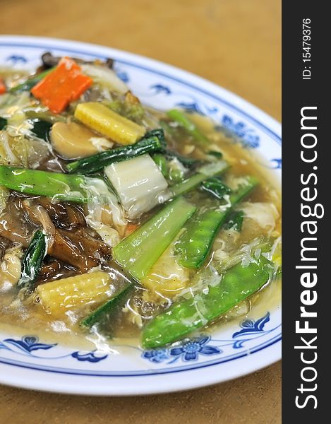 Asian style kway teow with healthy vegetables. Suitable for concepts such as diet and nutrition, healthy lifestyle, and food and beverage. Asian style kway teow with healthy vegetables. Suitable for concepts such as diet and nutrition, healthy lifestyle, and food and beverage.