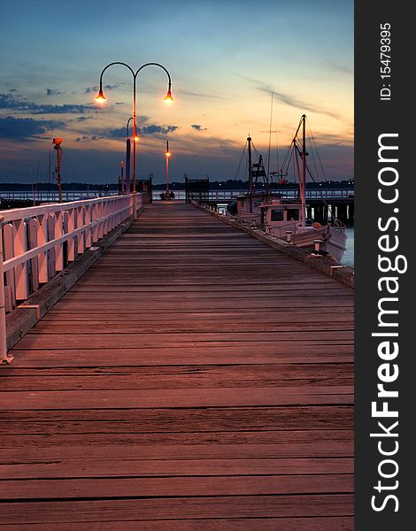 Jetty in a marina port in sunset. Jetty in a marina port in sunset