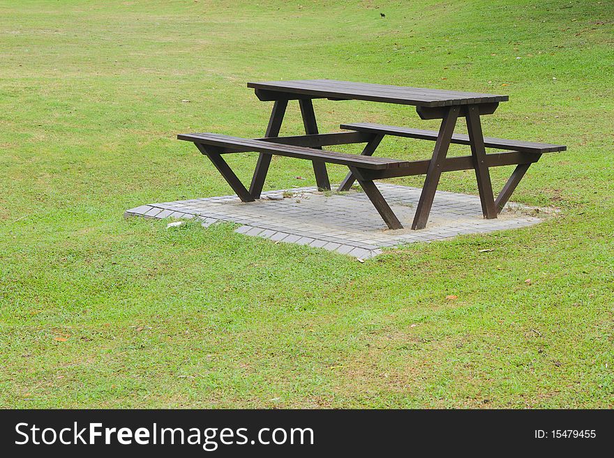 A bench in a field