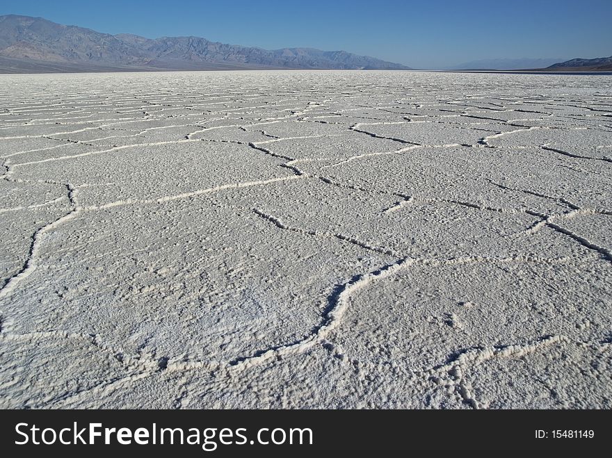 Salt polygons in Death Valley (California) salt lake in the early morning. Salt polygons in Death Valley (California) salt lake in the early morning