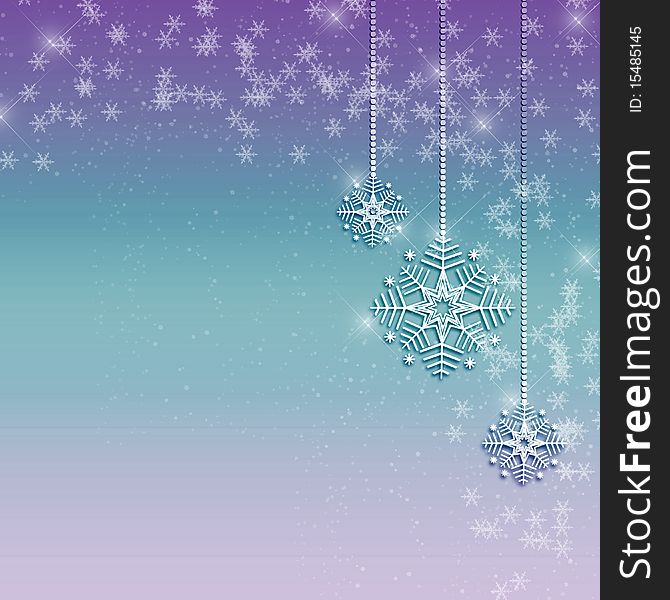 Three hanging snowflake ornaments on blue and purple background. Three hanging snowflake ornaments on blue and purple background