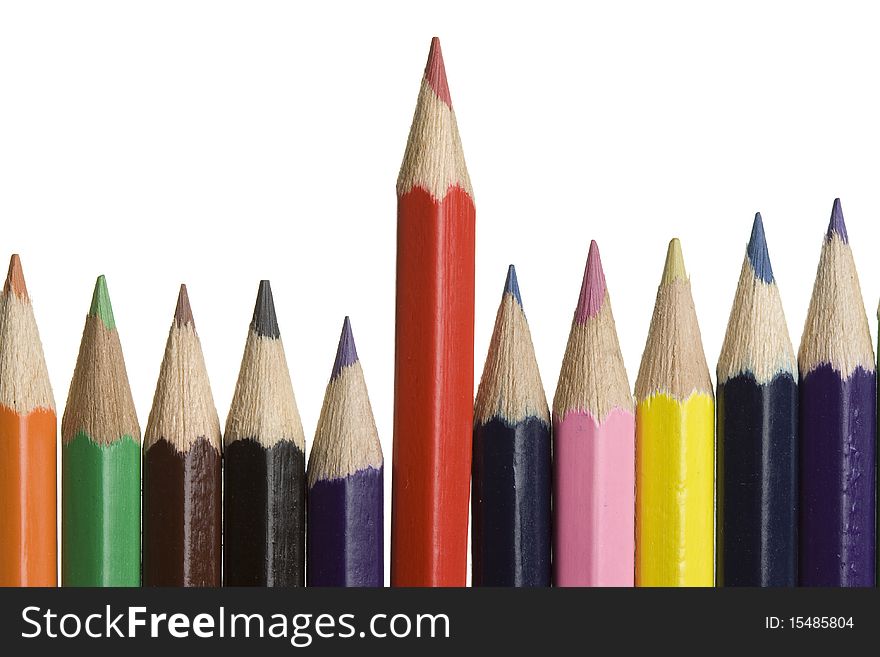 Crayons of different color on a white background