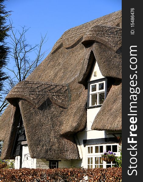 Image of a thatched roof home in the uk. Image of a thatched roof home in the uk