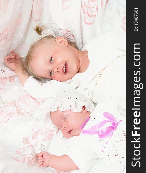 The image of the girl and its newborn sister. The image of the girl and its newborn sister