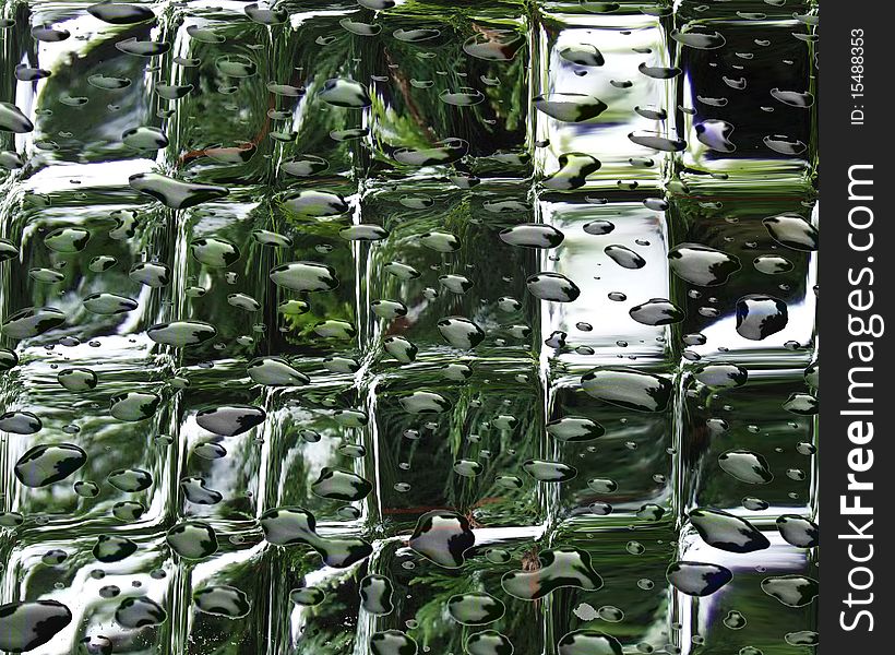 Green glass background with water drops